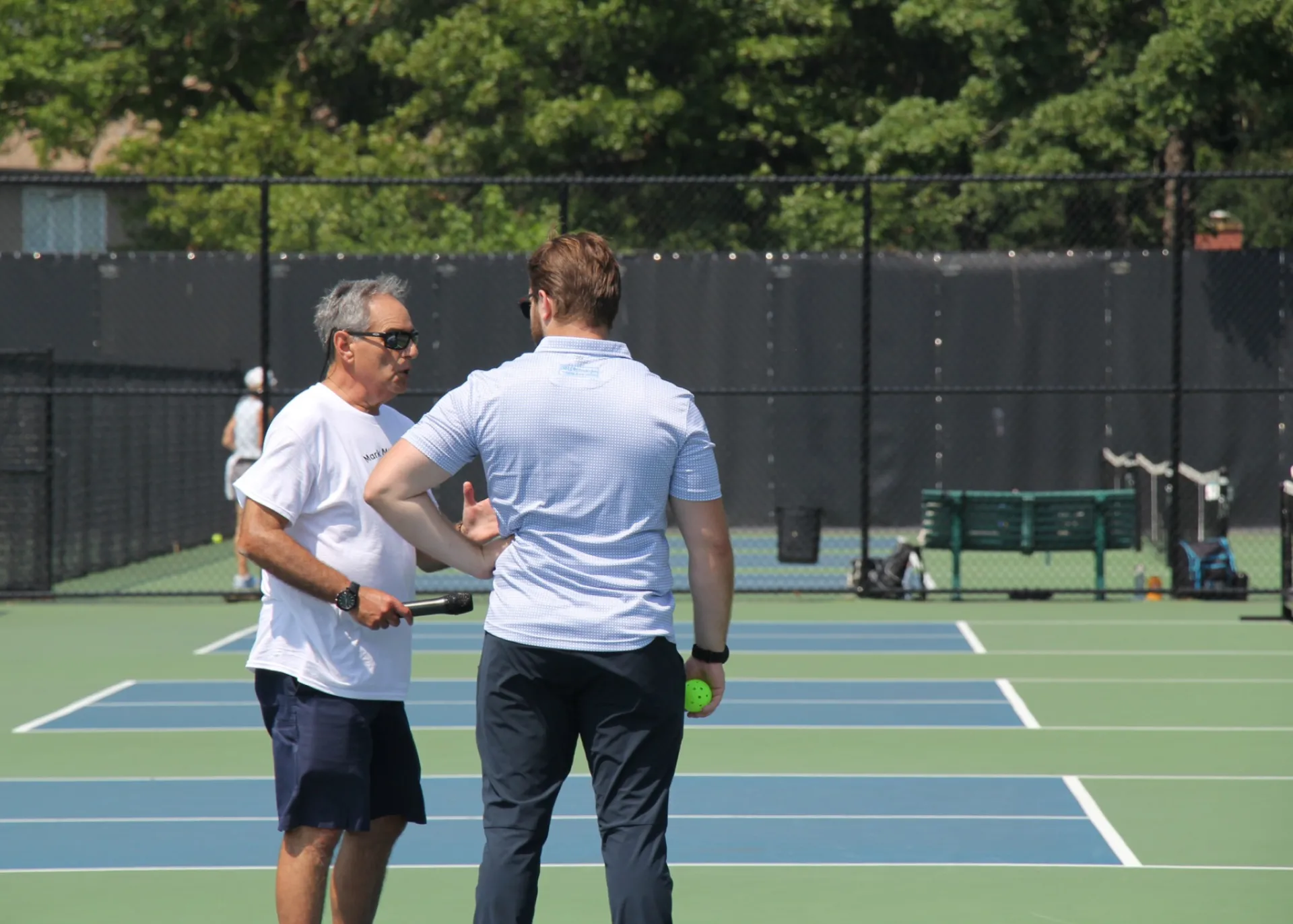 Mark Miller Chatting with Coach at Pickleball Lesson